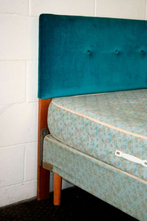 A stunning upholstered double-bed buttoned headboard with a Warner mattress & base.RS17Bed
