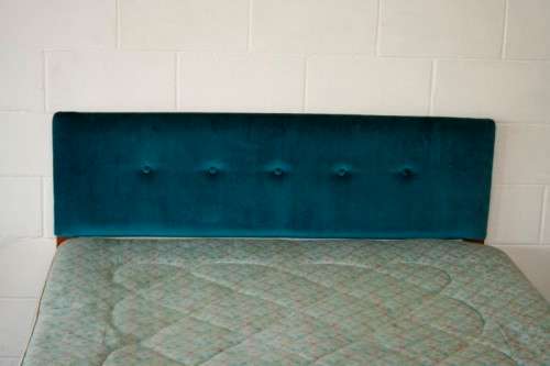 A stunning upholstered double-bed buttoned headboard with a Warner mattress & base.RS17Bed