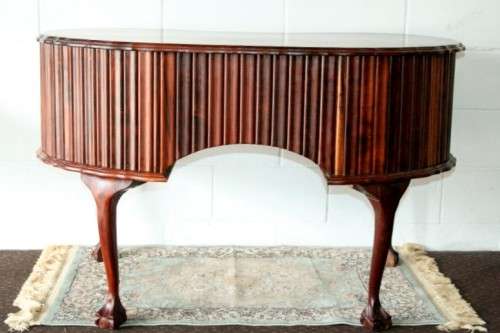 A stunning vintage solid Imbuia ball & claw kidney-shape "knee-hole" writing desk with five drawers