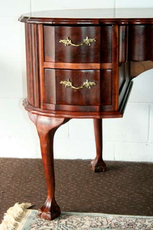 A stunning vintage solid Imbuia ball & claw kidney-shape "knee-hole" writing desk with five drawers
