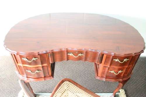 A stunning vintage solid Imbuia ball & claw kidney-shape "knee-hole" writing desk with five drawers