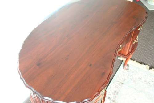 A stunning vintage solid Imbuia ball & claw kidney-shape "knee-hole" writing desk with five drawers