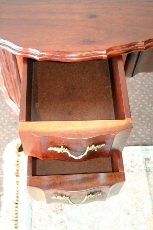 A stunning vintage solid Imbuia ball & claw kidney-shape "knee-hole" writing desk with five drawers