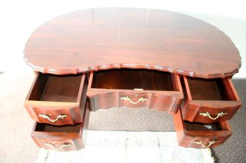 A stunning vintage solid Imbuia ball & claw kidney-shape "knee-hole" writing desk with five drawers