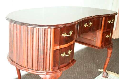 A stunning vintage solid Imbuia ball & claw kidney-shape "knee-hole" writing desk with five drawers