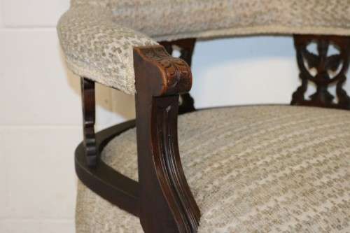 A wonderful antique Edwardian upholstered library armchair on its original castors - stunning!