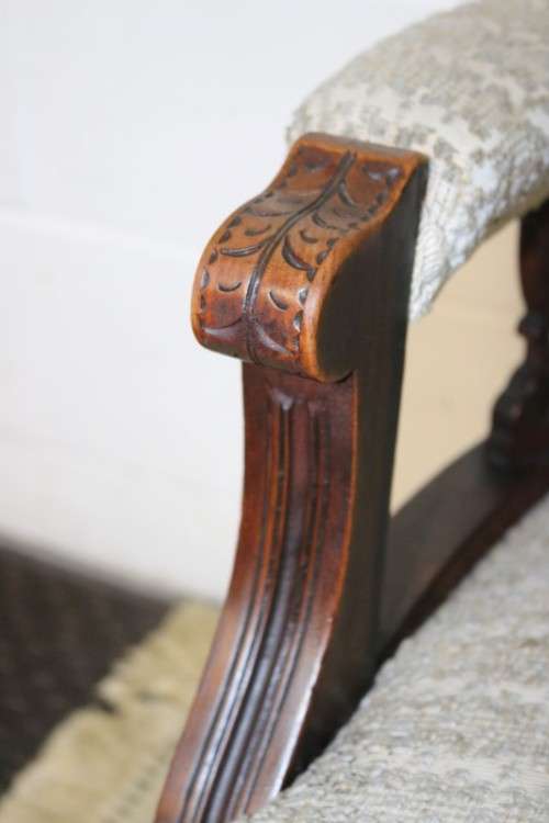 A wonderful antique Edwardian upholstered library armchair on its original castors - stunning!