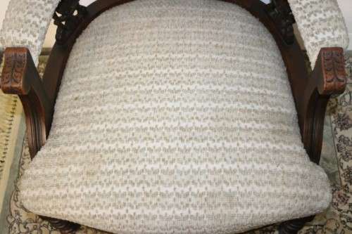A wonderful antique Edwardian upholstered library armchair on its original castors - stunning!