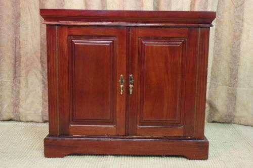 Fantastic and stunningly made double door mahogany cabinets on castors - ideal minibar in guest room