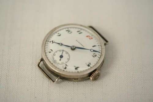 An exquisite antique 13 Jewell Swiss made "Sentinel" gents sterling silver trench watch = Beautiful!