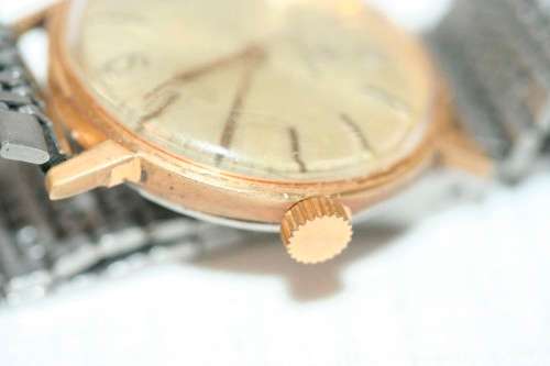 A superb vintage (1960's) gold plated gents Swiss made Buren wrist watch w/ a stainless steel strap