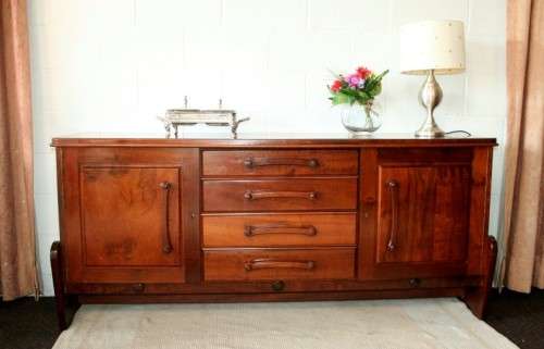 Solidly built vintage Imbuia buffet server with 4 large drawers & two cupboards
