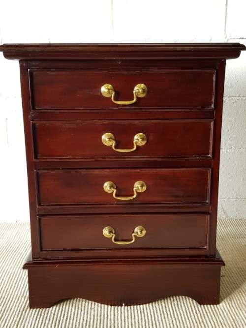 A wonderful Mahogany four-drawer pedestal/ chest of drawers with brass handles in good condition
