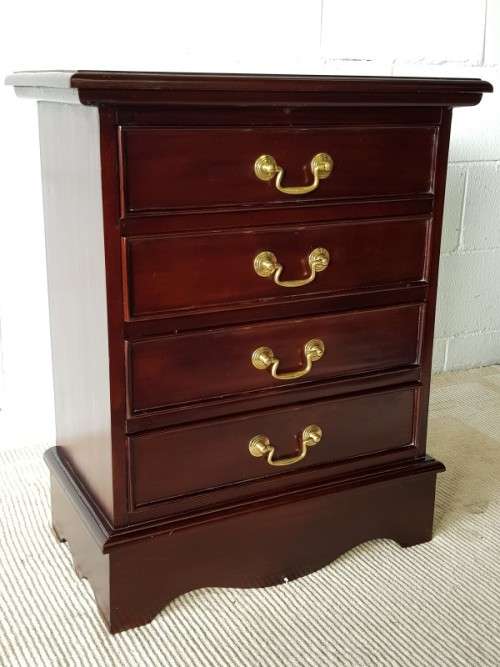 A wonderful Mahogany four-drawer pedestal/ chest of drawers with brass handles in good condition