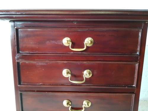A wonderful Mahogany four-drawer pedestal/ chest of drawers with brass handles in good condition