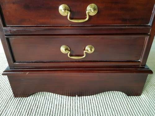 A wonderful Mahogany four-drawer pedestal/ chest of drawers with brass handles in good condition