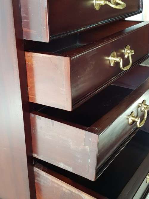 A wonderful Mahogany four-drawer pedestal/ chest of drawers with brass handles in good condition