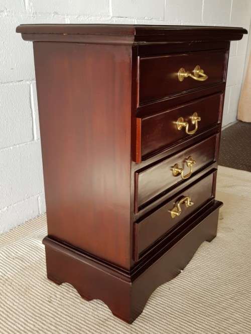 A wonderful Mahogany four-drawer pedestal/ chest of drawers with brass handles in good condition