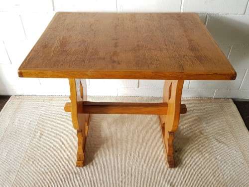 A well-made Oak coffee/ occasional table - perfect for a table lamp or a vase with flowers!