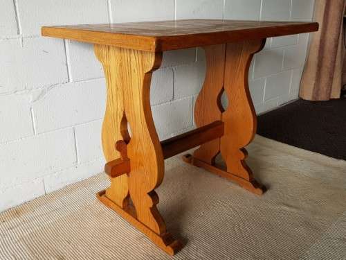 A well-made Oak coffee/ occasional table - perfect for a table lamp or a vase with flowers!