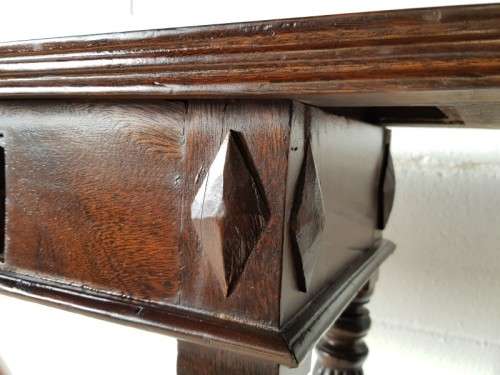 An amazing vintage two-drawer hallway table w fluted legs and lovely hand carved detailing