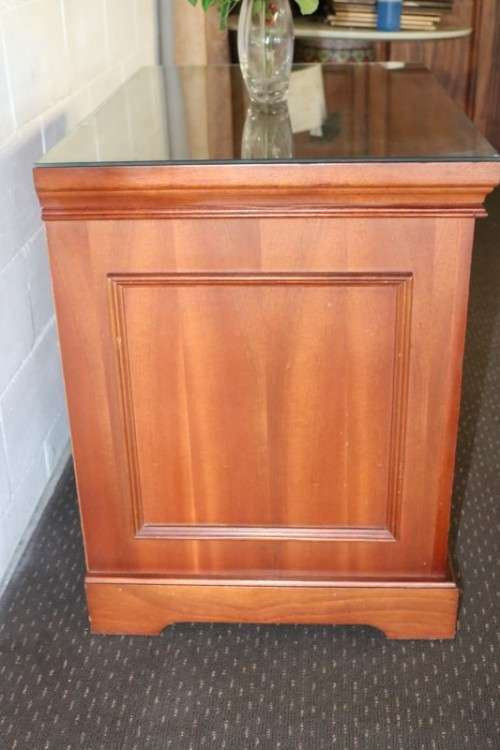 A wonderful Mahogany mini bar cabinet with shelves inside and a removable glass top on castors