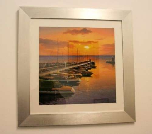 A stunning and vibrant framed painting print of sailing boats tied to a quay at sunset - RS17Sale