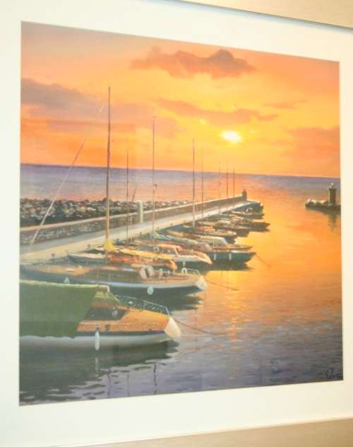 A stunning and vibrant framed painting print of sailing boats tied to a quay at sunset - RS17Sale