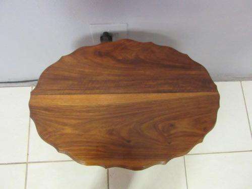 A gorgeous and stylish vintage solid teak oval occasional coffee table with scalloped style edges
