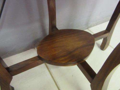 A gorgeous and stylish vintage solid teak oval occasional coffee table with scalloped style edges
