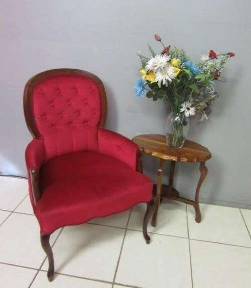 A gorgeous vintage solid Imbuia "Queen Anne" arm chair in a claret red velvet fabric