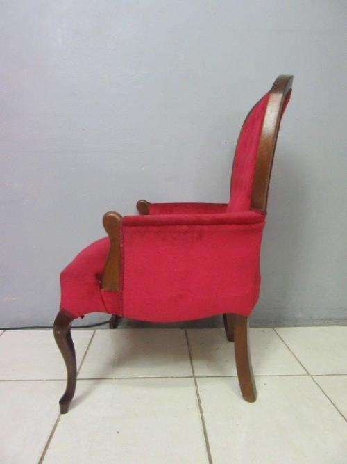 A gorgeous vintage solid Imbuia "Queen Anne" arm chair in a claret red velvet fabric