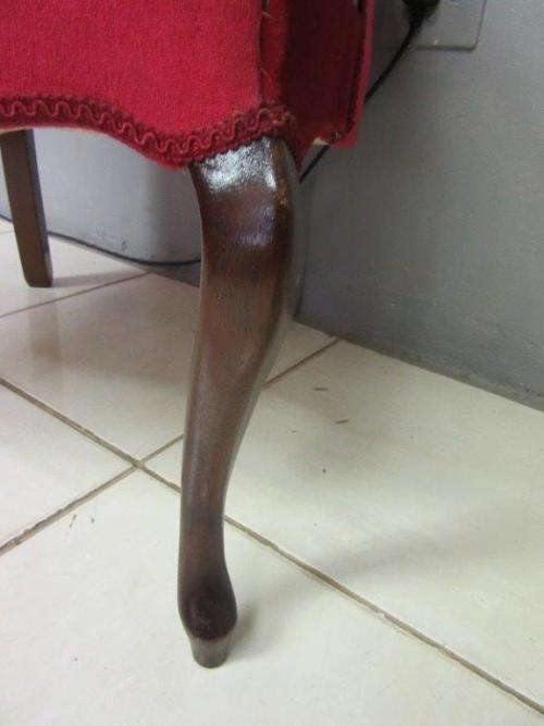 A gorgeous vintage solid Imbuia "Queen Anne" arm chair in a claret red velvet fabric