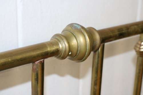 An amazing vintage Queen-size brass bed with a stunning brass headboard and footboard.RS17Bed