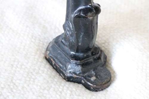 An amazing vintage cast iron sewing table with a wooden top - well made and very heavy!