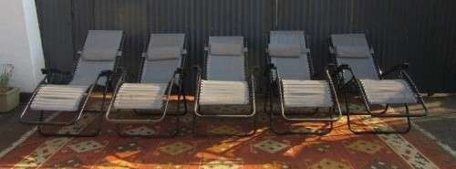 Five stunning metal and mesh reclining outdoor pool loungers in great condition - price/recliner