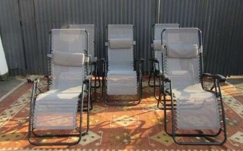 Five stunning metal and mesh reclining outdoor pool loungers in great condition - price/recliner