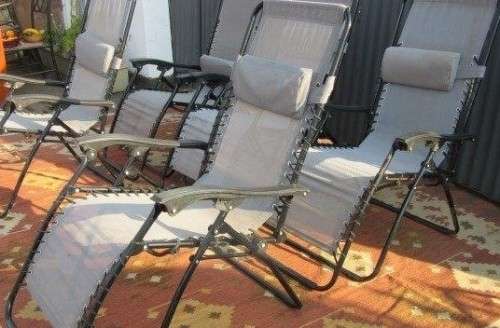 Five stunning metal and mesh reclining outdoor pool loungers in great condition - price/recliner