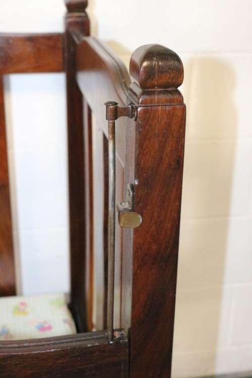 An awesome vintage solid Imbuia baby's cot on its original castors - perfect for nursery