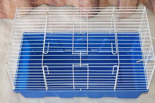 A well made plastic and steel pet (bunny, hamster etc) cage with an auto water dispenser