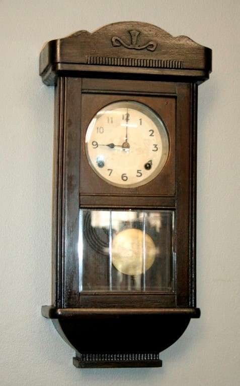 A beautiful vintage mechanical wall clock with a cut glass door and spiral gong in lovely condition
