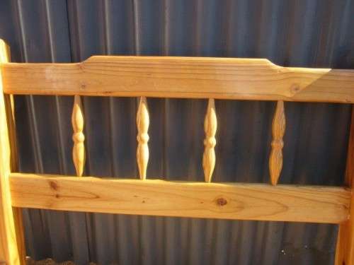 **RS17** Two natural pine spindle "single bed" size headboards in good condition. Bid/headboard