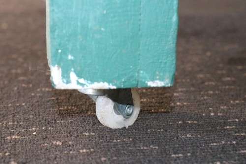 A rustic wooden painted occasional table on castors - perfect to re-paint/ shabby chic - RS17Sale
