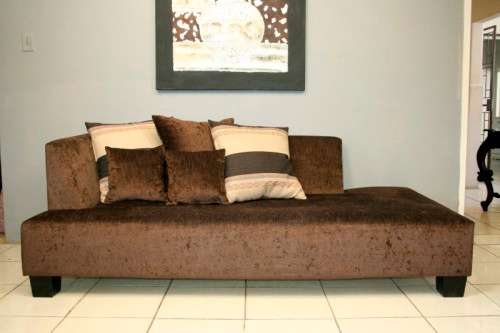 A superb modern (X-large) chocolate brown fabric couch w/ stunning cushions in exquisite condition