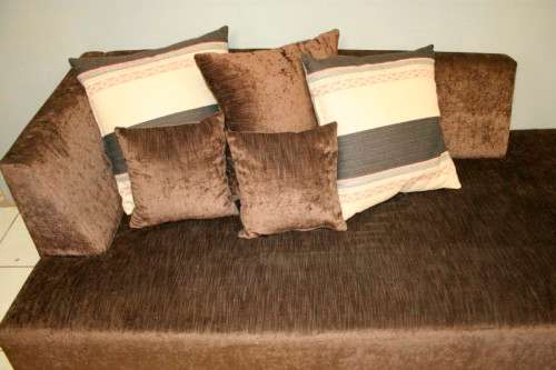 A superb modern (X-large) chocolate brown fabric couch w/ stunning cushions in exquisite condition