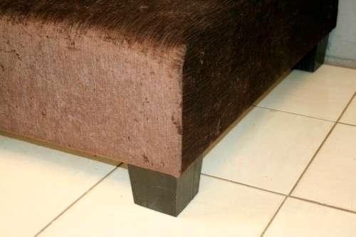 A superb modern (X-large) chocolate brown fabric couch w/ stunning cushions in exquisite condition