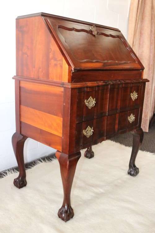 A fantastic antique (c.1935) Imbuia ball & claw fall-top writing bureau with two large drawers