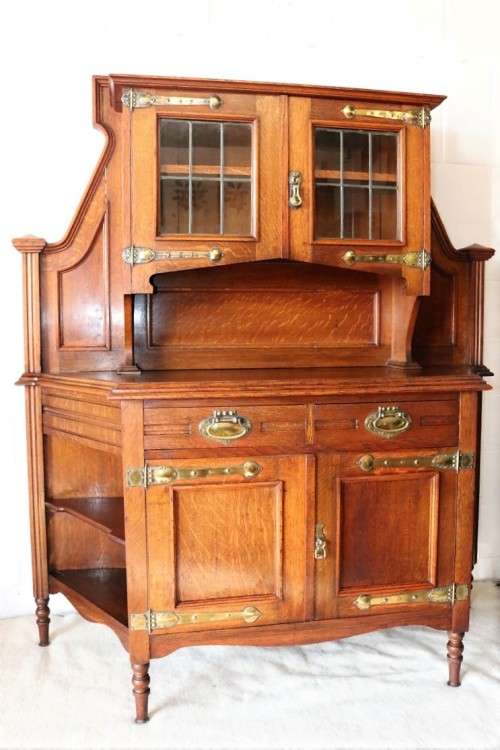A superb antique Edwardian solid honeyed Oak buffet hutch server w/ spectacular brass embellishments
