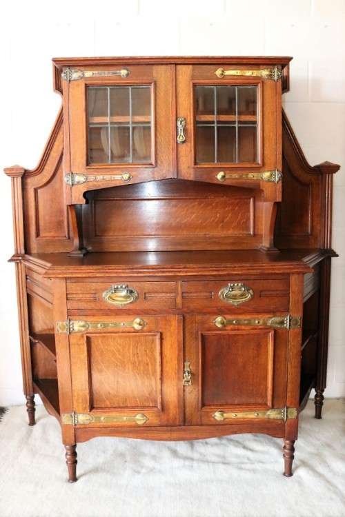A superb antique Edwardian solid honeyed Oak buffet hutch server w/ spectacular brass embellishments