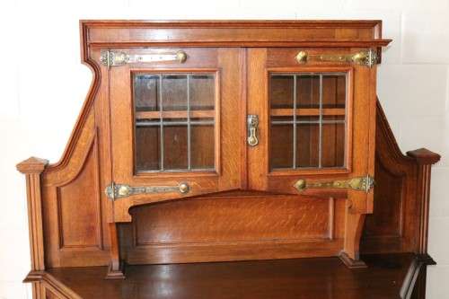 A superb antique Edwardian solid honeyed Oak buffet hutch server w/ spectacular brass embellishments